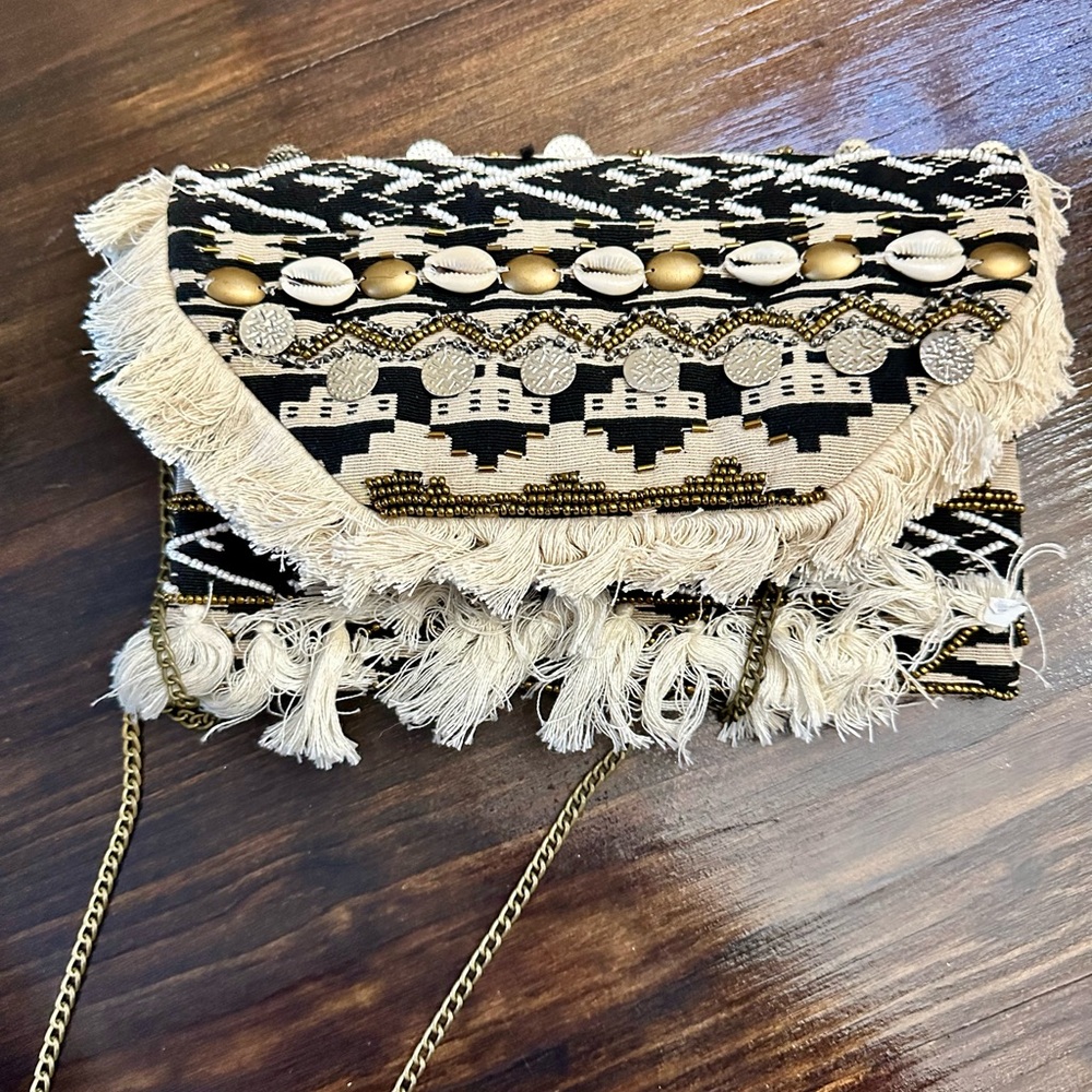 Shell & fringe crossbody clutch
